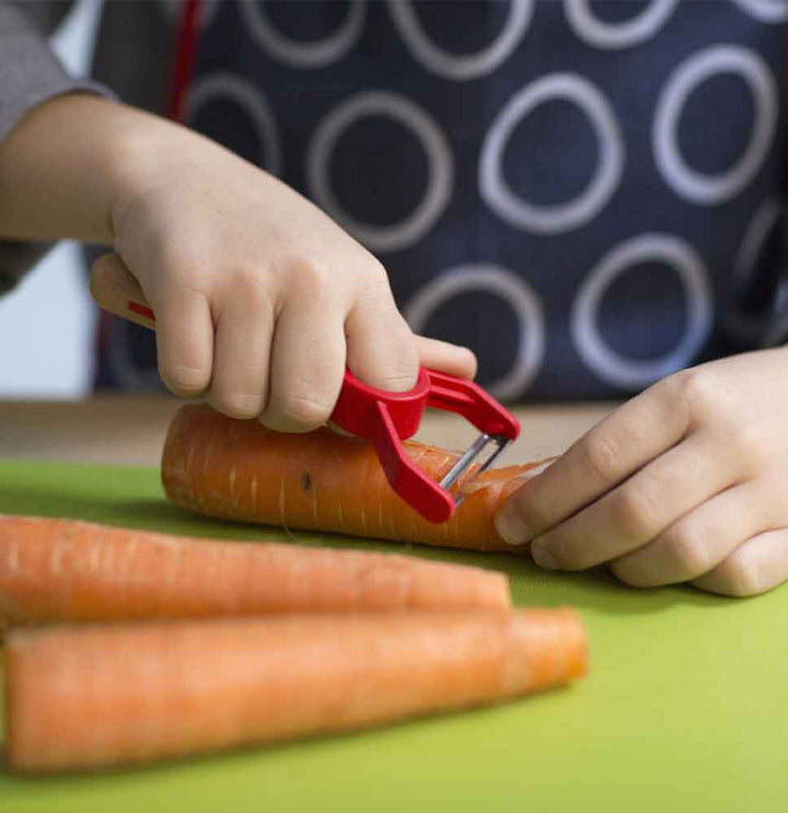 éplucheur équipé également d'un anneau pédagogique