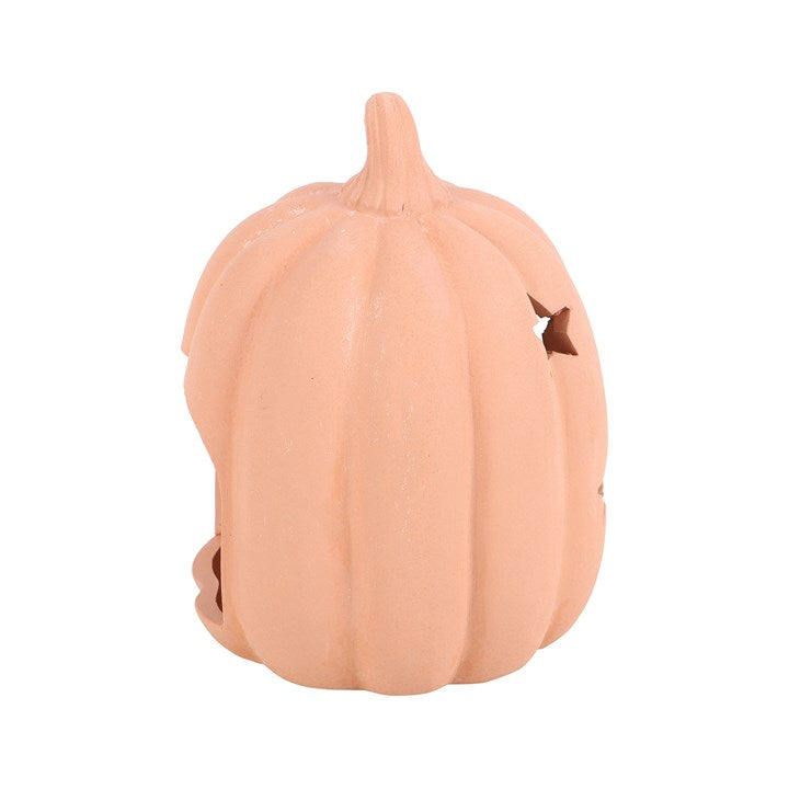 Portavelas de terracota con forma de estrella y calabaza