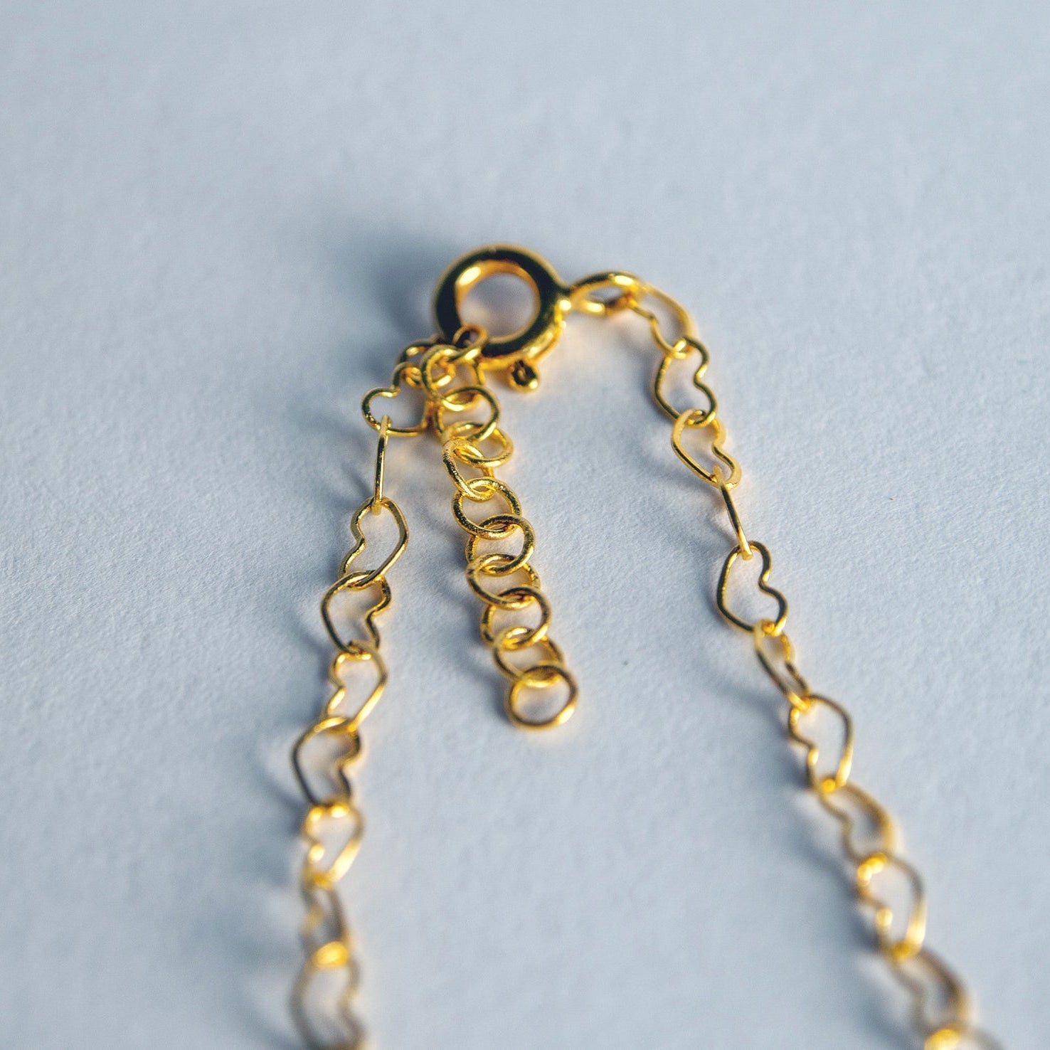 Collier chaîne coeurs entrelacés