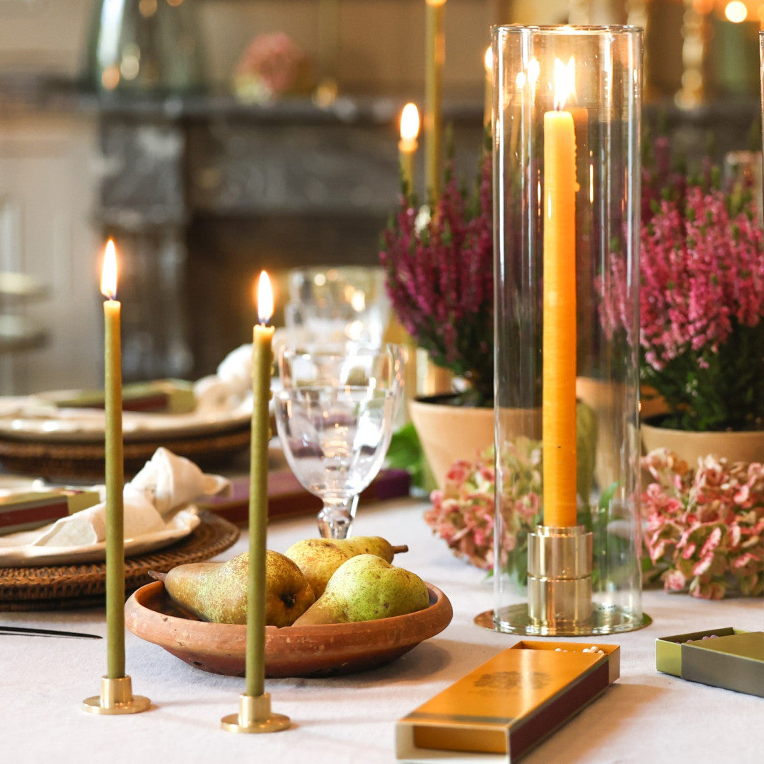 Two brass candle holders for fine candles