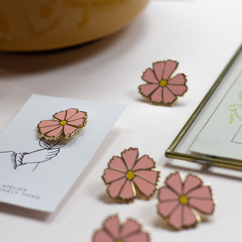 Pin's Cosmos en Laiton